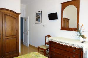 TV a/nebo společenská místnost v ubytování Hotel Roma
