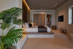 Halcyon Days Suites客房内的一张或多张床位