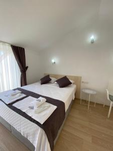Postel nebo postele na pokoji v ubytování Nefis Hotel Ölüdeniz