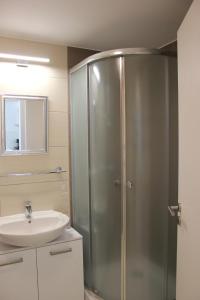 Kúpeľňa v ubytovaní Katus Apartman Siófok