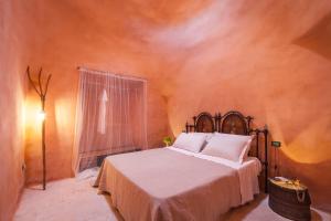 Uma cama ou camas num quarto em Trulli 18cinquantanove