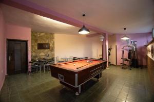 a room with a pool table in it at Старата баkалия The old grocery, guest rooms in Balchik