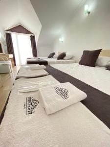 Postel nebo postele na pokoji v ubytování Nefis Hotel Ölüdeniz