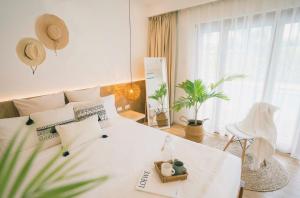 Llit o llits en una habitació de Ultra Mint Dive Resort