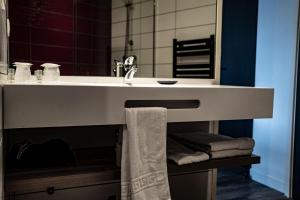 Ванная комната в Hotel De Quebec
