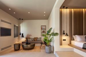 Halcyon Days Suites客房内的一张或多张床位