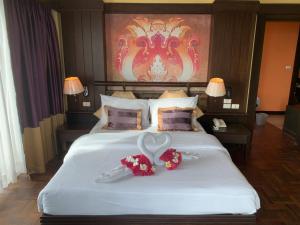 Katil atau katil-katil dalam bilik di Sarita Chalet & Spa Hotel - SHA Extra Plus