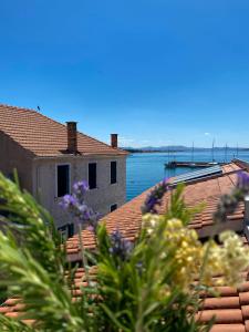 a view of the water from the roof of a house at Villa Adria in Vodice