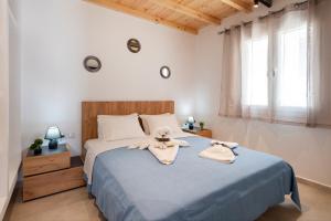 Säng eller sängar i ett rum på Blue View Villa #3 With Jakuzzi