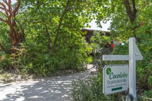 Een tuin van Cocolobo Resort