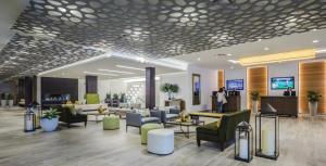 TV a/nebo společenská místnost v ubytování Lodge Geneva National