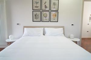 Een bed of bedden in een kamer bij Casa Rubini