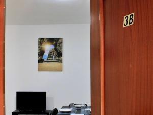 TV a/nebo společenská místnost v ubytování SFJ Apartamento Arrecife