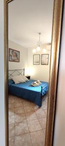A bed or beds in a room at Affittacamere Angela