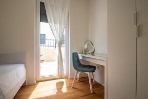Postel nebo postele na pokoji v ubytování Boutique La Perla with private pool