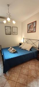 A bed or beds in a room at Affittacamere Angela