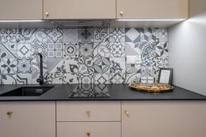 Kuchyň nebo kuchyňský kout v ubytování Apartamenty ZŁOTY PIERNIK + 26 fotografií