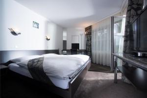 TV o dispositivi per l'intrattenimento presso Grand Hôtel Les Endroits