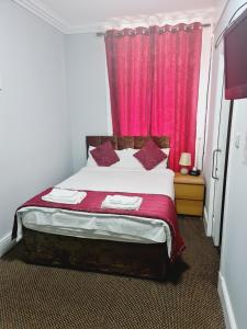 Postel nebo postele na pokoji v ubytování Dalry Guesthouse