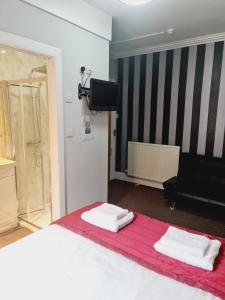 Postel nebo postele na pokoji v ubytování Dalry Guesthouse