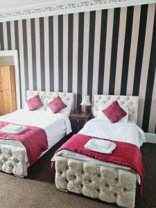 Postel nebo postele na pokoji v ubytování Dalry Guesthouse