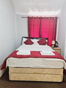 Postel nebo postele na pokoji v ubytování Dalry Guesthouse
