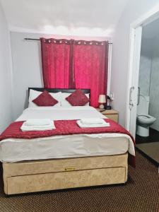 Postel nebo postele na pokoji v ubytování Dalry Guesthouse