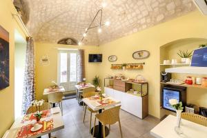 Reštaurácia alebo iné gastronomické zariadenie v ubytovaní B&B Via Barocca