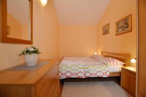 Postel nebo postele na pokoji v ubytování Zminj Apartments