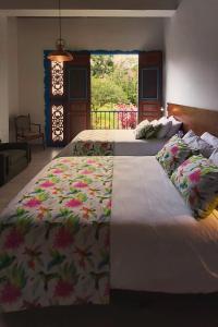 Ένα ή περισσότερα κρεβάτια σε δωμάτιο στο Balsora Hotel Boutique