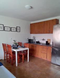 Kuchyňa alebo kuchynka v ubytovaní Apartamenty Amarel + 10 fotografií
