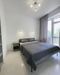 Postel nebo postele na pokoji v ubytování Boutique Hotel Enjoy