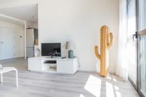 Telewizja i/lub zestaw kina domowego w obiekcie Málaga estación centro playa