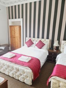 Postel nebo postele na pokoji v ubytování Dalry Guesthouse
