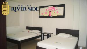 Hotel River Side客房内的一张或多张床位
