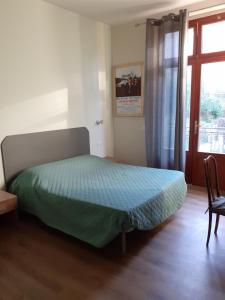 Postel nebo postele na pokoji v ubytování CIAK Affittacamere