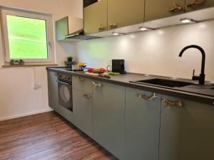 A kitchen or kitchenette at sünnala Még 6 kép