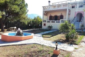 Zahrada ubytování Coastal Oasis Villa