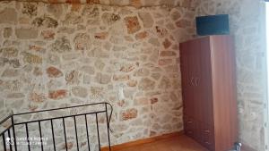 A television and/or entertainment centre at Climati Studios