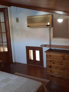 A bed or beds in a room at Harbour View Apartment