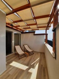Televízia a/alebo spoločenská miestnosť v ubytovaní Njivice, otok Krk, apartman Dora + 37 fotografií