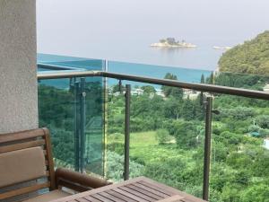 a balcony with a view of the ocean at The View apartment in Petrovac na Moru