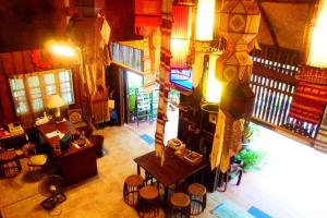 Posezení v ubytování Baantawan Guesthouse Pai
