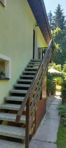 a set of stairs leading to a house at Pension U Štěpánků in Trpišovice