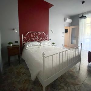 Posteľ alebo postele v izbe v ubytovaní CASA FEMI