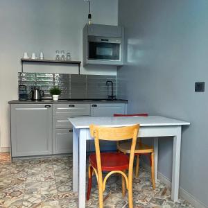 Kuchyňa alebo kuchynka v ubytovaní CASA FEMI
