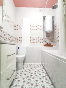 Vonios kambarys apgyvendinimo įstaigoje Manufactura luxery apartments
