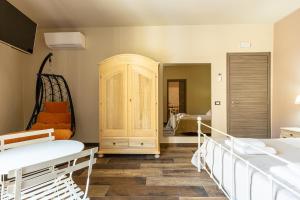 a bedroom with two bunk beds and a cabinet at Sant'Alfonso in Agrigento