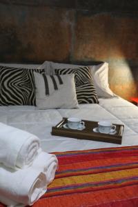 Tempat tidur dalam kamar di Casa com Quarto Simples a 4 KM do aeroporto de São José dos Pinhais