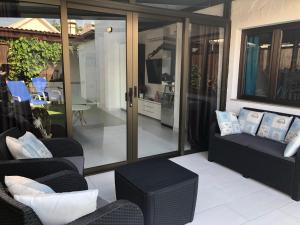 A seating area at Bungalow Atos With Private Garden